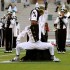Above, a North Atlanta warrior leads a performance at halftime.