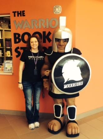 New Warrior mascot Maximus with faculty member Deanna Hasty.
