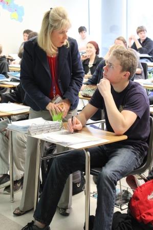 Eleanor Brookins assists one of her students. 