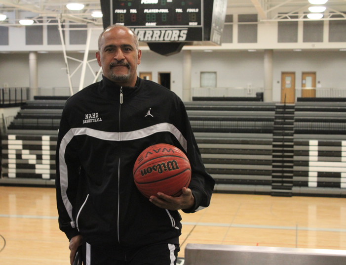 Basketball coach, Kerry Sarden, sports his NAHS basketball warmups in anticipation for the upcoming season. 