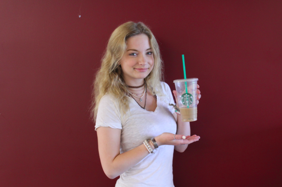 Freshman+Sadie+Stovin+is+a+major+supporter+of+the+Starbucks+coffee-craze.+