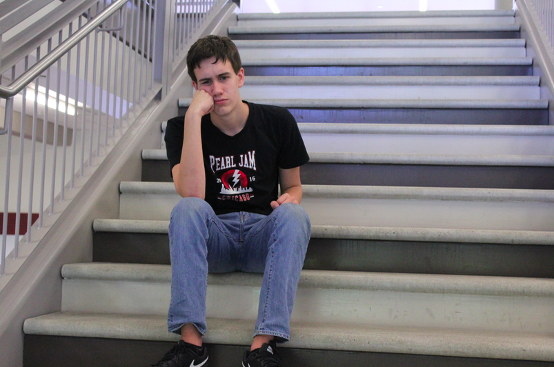 Editorial Writer Jack Yanoshik pouts about the lack of escalators in NAHS. 