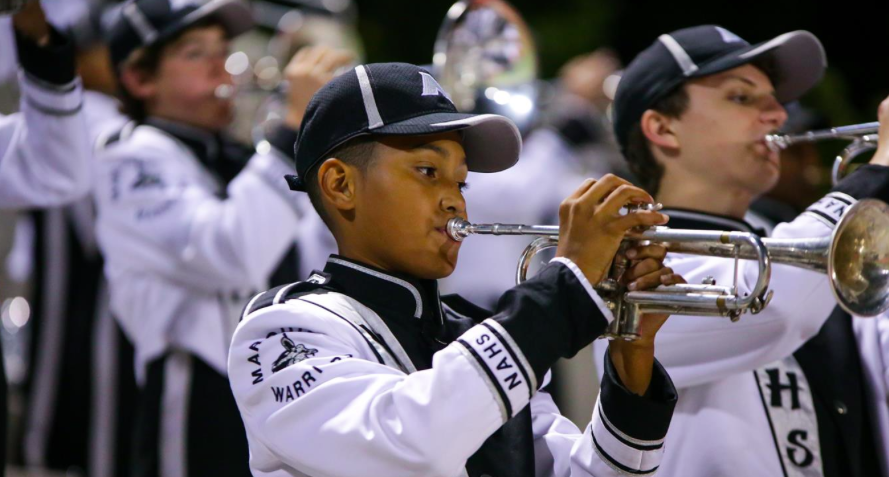 Marching Band is responsible for keeping the crowd and student section on their feet at football games. 