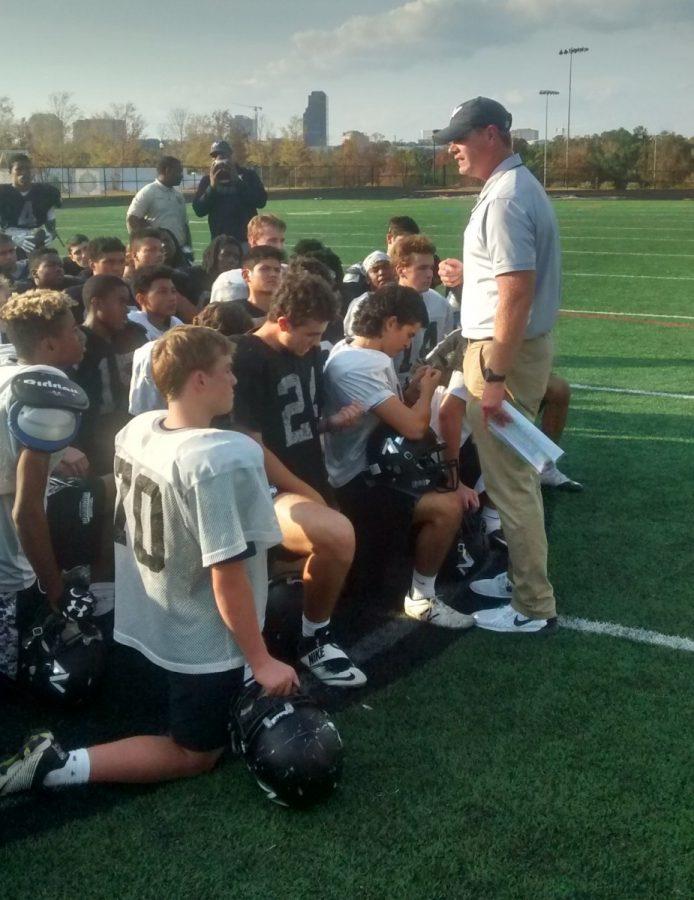 Warrior head coach Jeremy Gainer gives an end-of-the-season talk to members of the 2016 Warrior football team. 