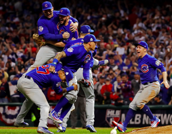 Cubs players celebrate after their world series win. 