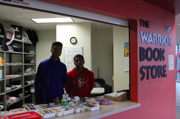 Students Kai and Michael work their shift in the Warrior Book Store during lunch. 