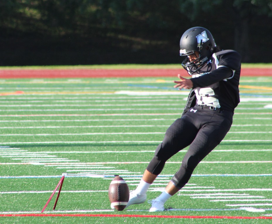 Senior place-kicker Ale Marin works on his form during a recent Warrior football practice.  
