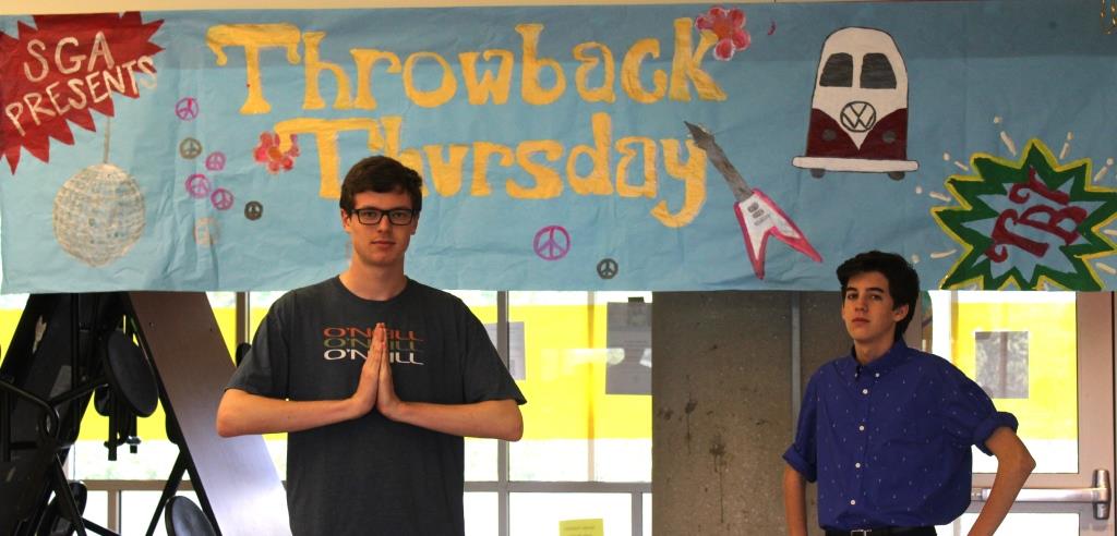 Seniors Jack Henderson and Chandler Smith were part of a platoon of SGA officers who gave the school cafeteria an explosion of colorful homecoming week-related banners. 

