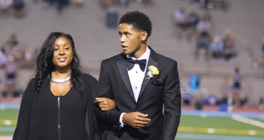 Mr. North Atlanta 2017 Bakari Smith was escorted at halftime by his mother Kamika Smith.
