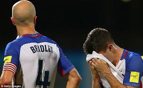 At game’s end, members of the U.S. Men’s National Soccer Team absorb the grim reality that they won’t be playing in the 2018 World Cup in Russia.