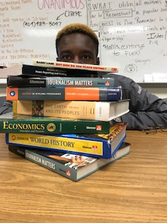 The workload piles higher and higher for junior IB student Dante Bastien. 