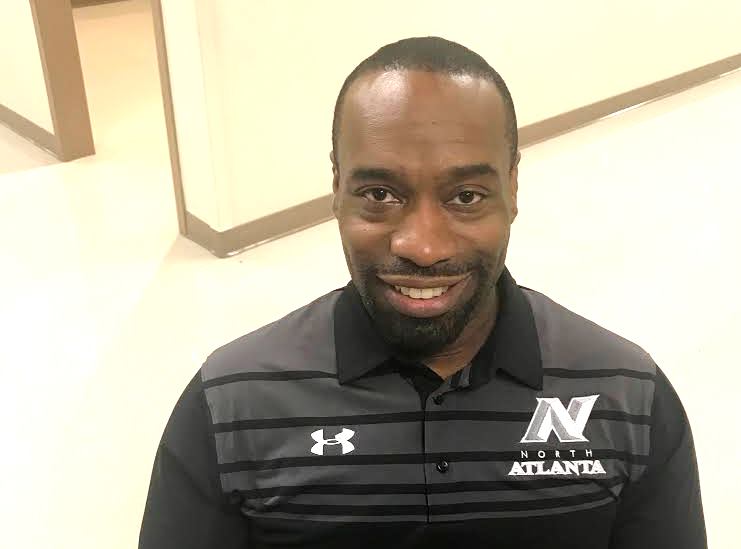 Academic Paydirt: School counselor Marc Genwright leads the school’s 12th Man program for North Atlanta football players. Lenox Johnson 
