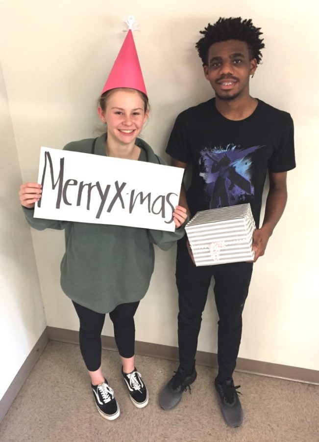 Bring On the Yule: Sophomores Greg Gosha and Taylor Hicks make ready for the holidays at North Atlanta. 
