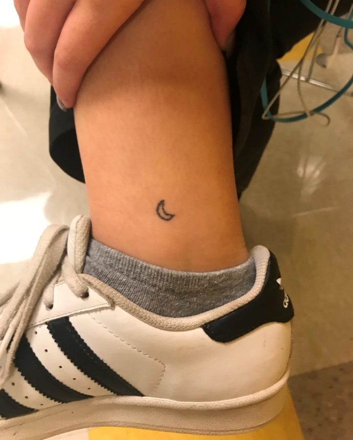 Improvised Ink: The ankle of Sophomore Barrett Dougher reveals both a moon and the art also underscores the popularity of stick-and-poke tattoos. 