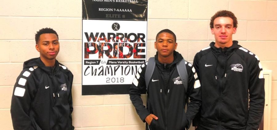 Push To The Final Four: The Warriors are on an amazing run and a win against Heritage could get them to the Final Four. Shown left to right are junior Messiah Thompson and seniors Desmond Thomas and Andrew Stimpson.

