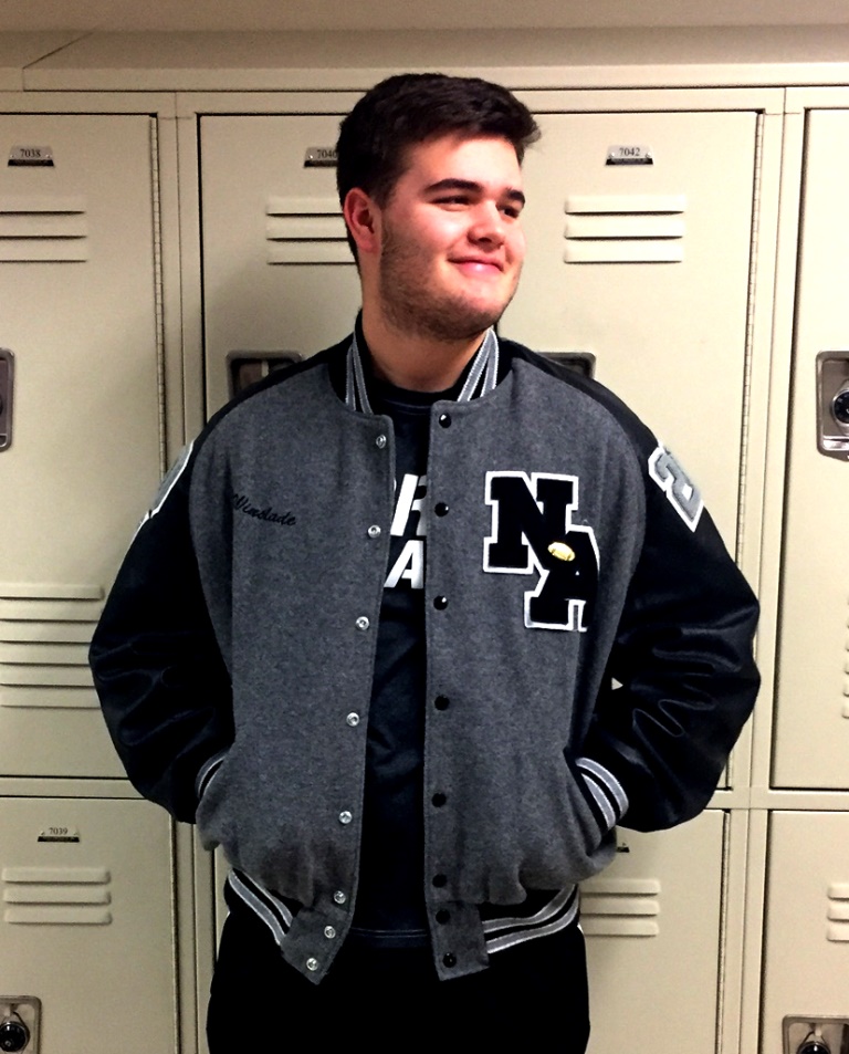 Varsity Style: Sophomore football player William Winslade goes all in for the black and silver and reps for his high school with a letterman’s jacket.