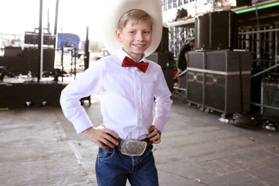 Mason Ramsey poses at Coachella for his maiden performance.