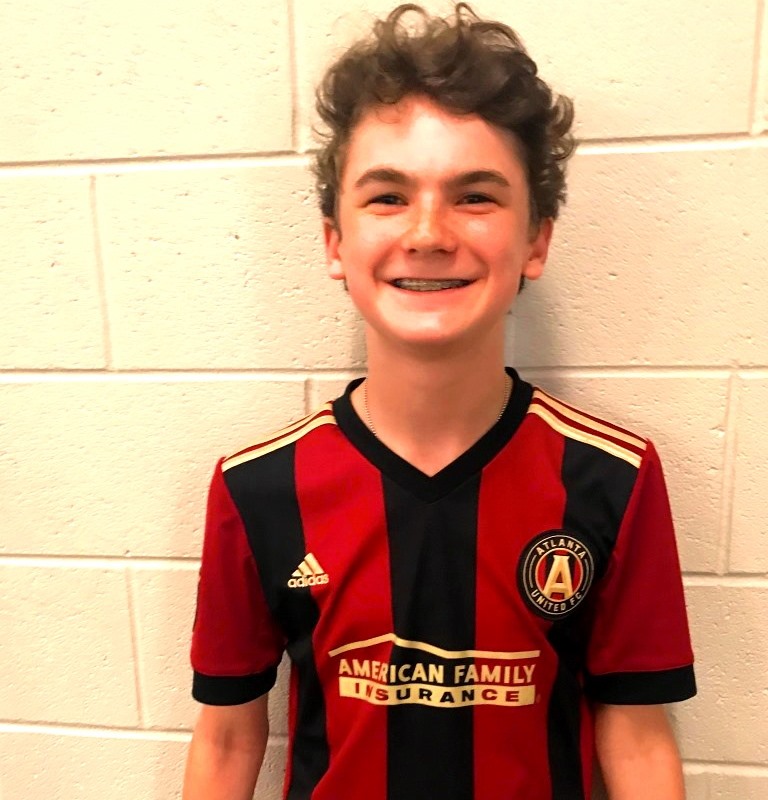 Five Stripes Fanatic: Sophomore Bennett Speir, repping his favorite team, is one of many Atlanta United fanatics found among North Atlanta students. .