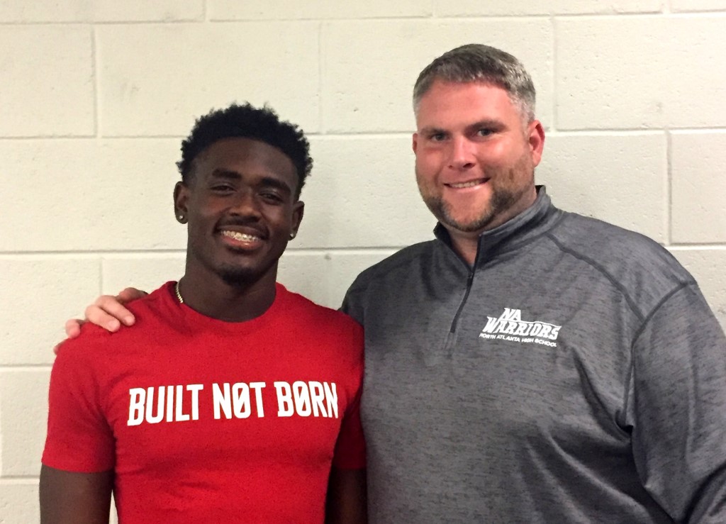 Head Honcho: New head football coach Sean O’Sullivan will lead the Warriors to gridiron success. Junior Justin Saunders is among the players who are excited about what the new coach will bring to the program.