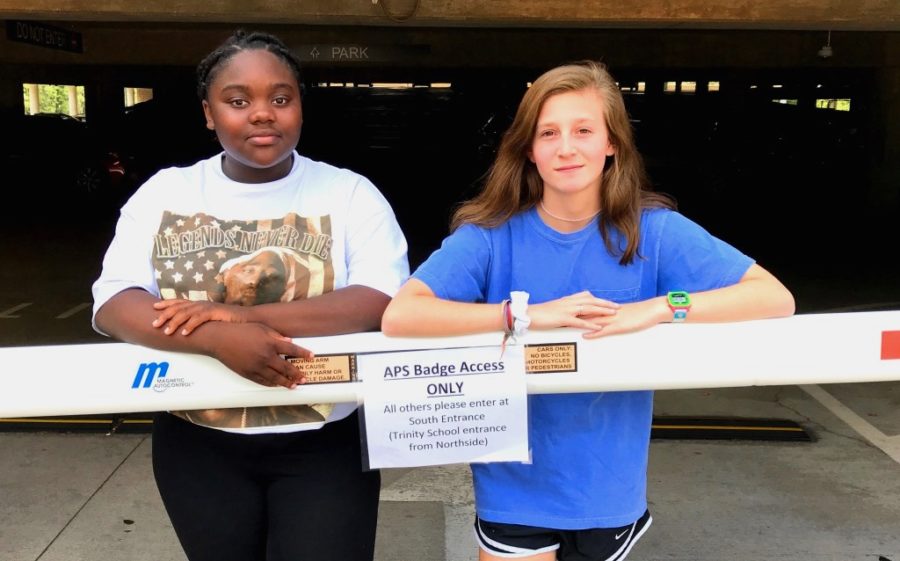 Gate Debates: Juniors Ayana Ellison and Annabelle Sarkissian are among the many North students getting used to traffic control rules and regs in the North Atlanta parking deck. 