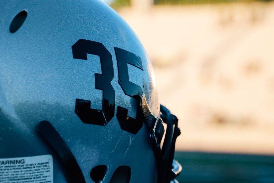 Roll Dubs: The Warriors new Alabama style “old school” helmet design on display against Kipp. 
