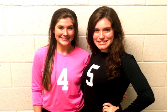 Dynamic Duo: Seniors Pressley Perkins and Delaney Elder -- beyond playing on the Warrior volleyball team -- offer significant organizational help for the Athletic Department. 