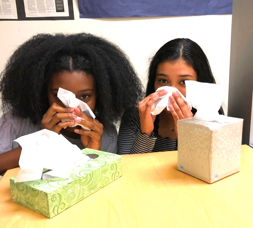 Kleenex Please: Sophomores Adrienne Pugh and Jaquelin Piza are among those contending with an early-arriving cold season at North Atlanta. 