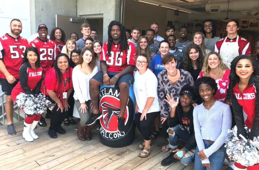 Falcon Fine Art: North Atlanta arts and athletics students celebrate the start of the new Student Athlete Art Leadership Team with the Falcons program, Hometown Huddle.