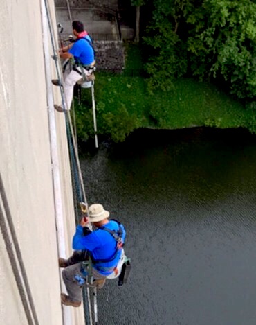 Through the Looking Glass: The window washers at North Atlanta hang from the building, making sure that the school windows stay squeaky clean. 