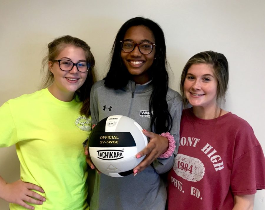 Bump, Set, Spike, Win: Seniors Jenna Campbell, Chelsea Howard, and Pressley Perkins prepare for a successful volleyball season by training the team and boosting morale. 