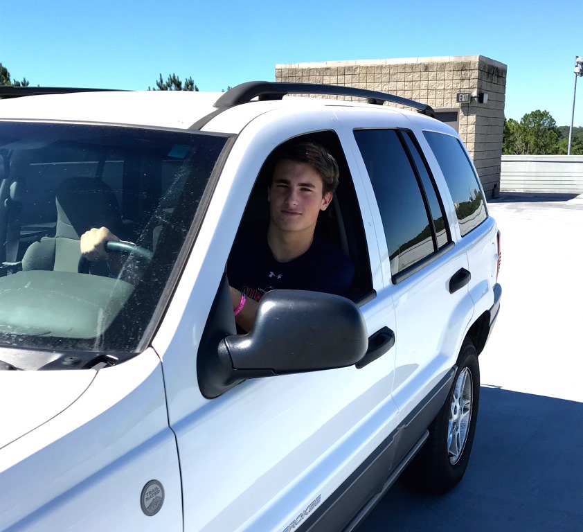 Reckless Wreck: Junior James Brewer simulates what a reckless driver in their car would look like, prowling the jungles of the parking deck.