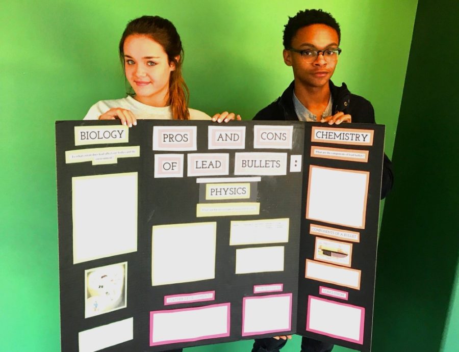 Group Gripes: Juniors Sally Witt and Mack Walker present their IB Group 4 projects on lead bullets. 