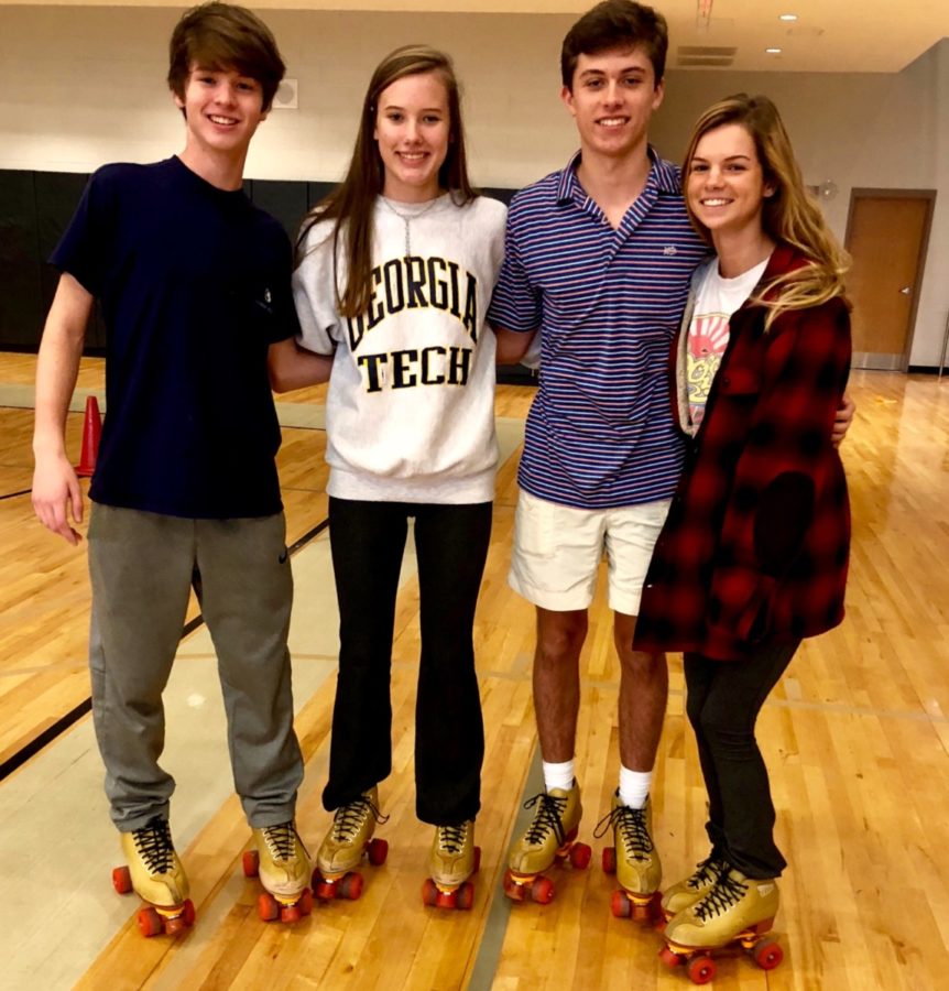 Hot on Wheels: Freshman Bryce McGowan, and Sophomores Lily Jones and Tyler Hankin roll their way through the P.E. roller skating curriculum. 