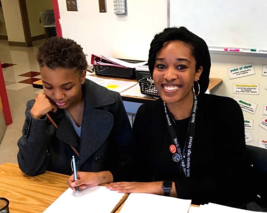 Book It: Literature instructor Kaila Corbin takes pride working with her students, such as freshman Asia Abernathy, and teaching her classes to analyze new literature every day. 