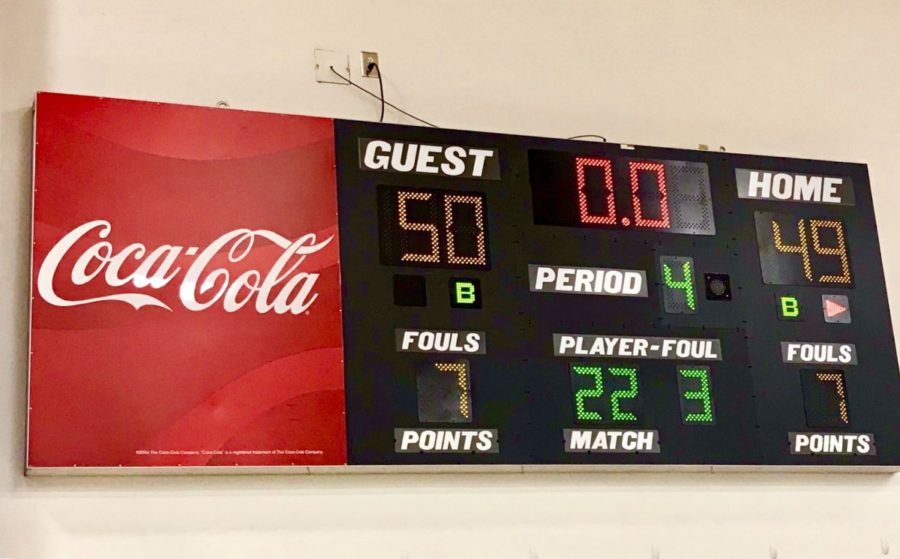 Leader Board: North Atlanta students holds their breath as they stare at the scoreboard featuring the winnings and losses of the teams, eventually ending with a North Atlanta victory.