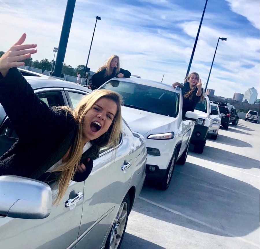 Through the Labyrinth: Sophomores Claudia Derek, Kate Jackson, Lexi Perry deal with the challenges of navigating through the parking deck traffic. 