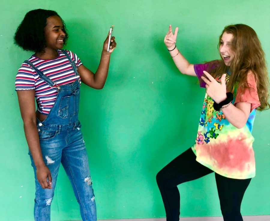 Clocked Out: Sophomores Luella Dennis and Amaya Bacon use TikTok to create short, fun videos for entertainment. 