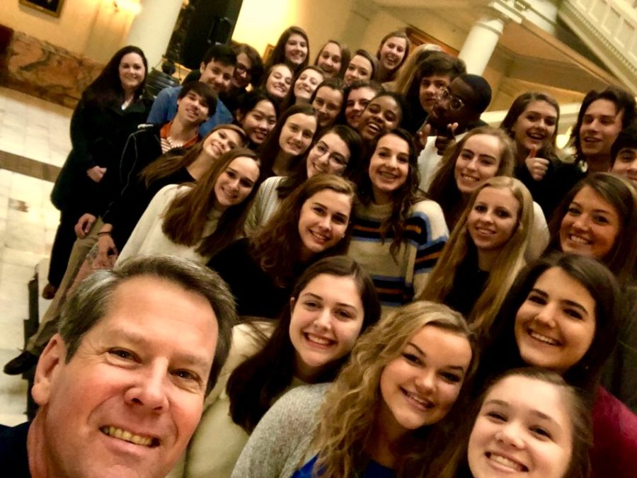 Rho(d) to Leadership: The Rho Kappa group takes a photo with Governor Brian Kemp at the Georgia State Capitol.