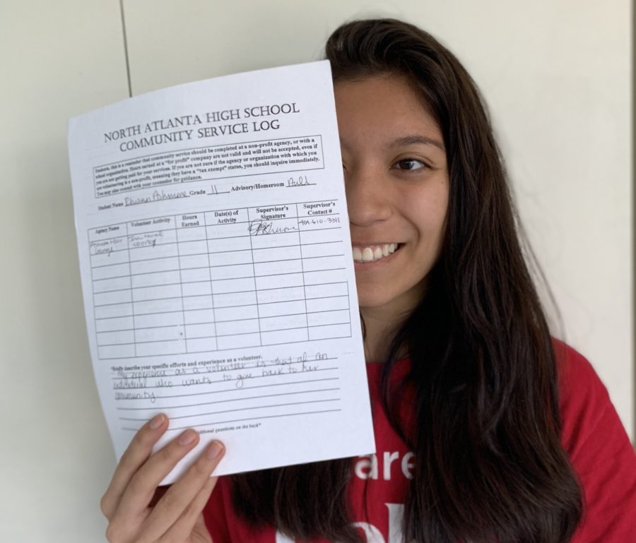 Community+Crisis%3A+From+freshmen+to+seniors%2C+all+North+Atlanta+students+battle+with+the+challenge+of+completing+their+service+hours+before+graduation.+
