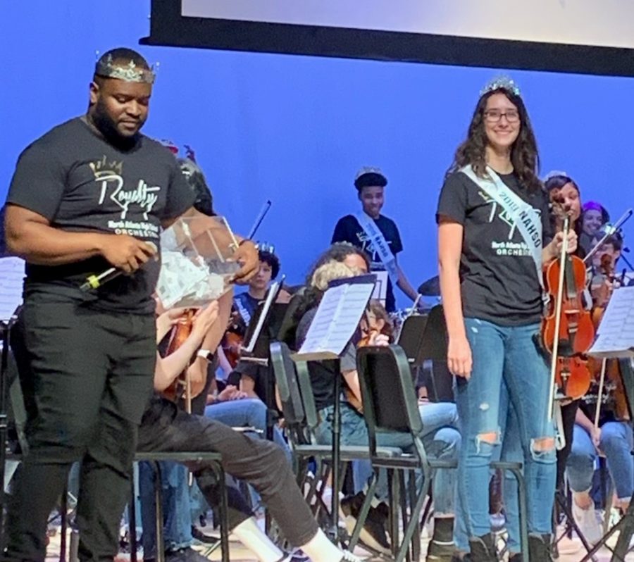 Senior Moment: Violinist Lila Ward was one of many orchestra seniors honored during the April 25 Spring Concert. She is shown on stage here with orchestra director Stephen Lawrence. 
