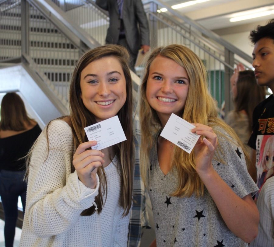 Picture Perfect: Sophomore Judith Shuelleser and Junior Alexandra Jarrard look their best for their spot in the yearbook. 
