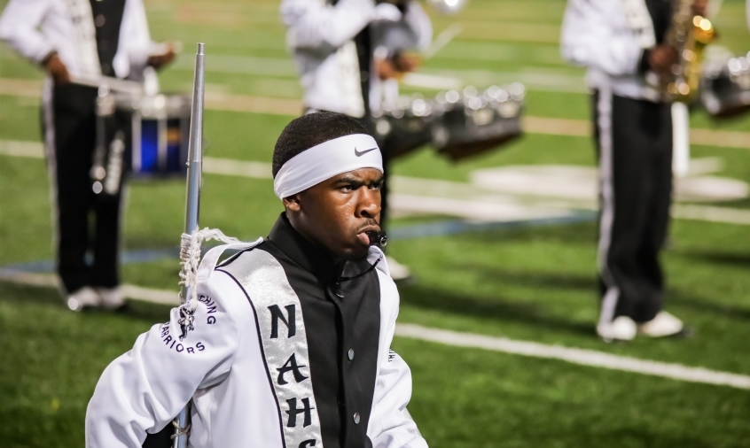 Major Moves: Lead Drum major Chase Brathwaite, a senior, does all performances in full intensity mode. He led the Marching Warriors during their halftime performance for the Oct. 10 homecoming game. 