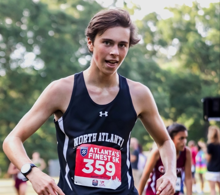 On Your Mark, Get Set, Go: Junior Andrew Churchill, one of the top runners on North Atlantas 2019 varsity cross country team, finishes within the top 10 at region race, helping the Warriors edge out their competition.

