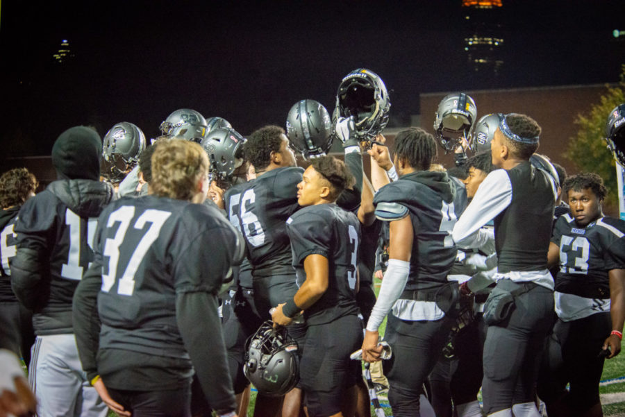 Playoff Predators: The Dubs raise their helmets in celebration but look forward to making a statement in the state playoffs.
