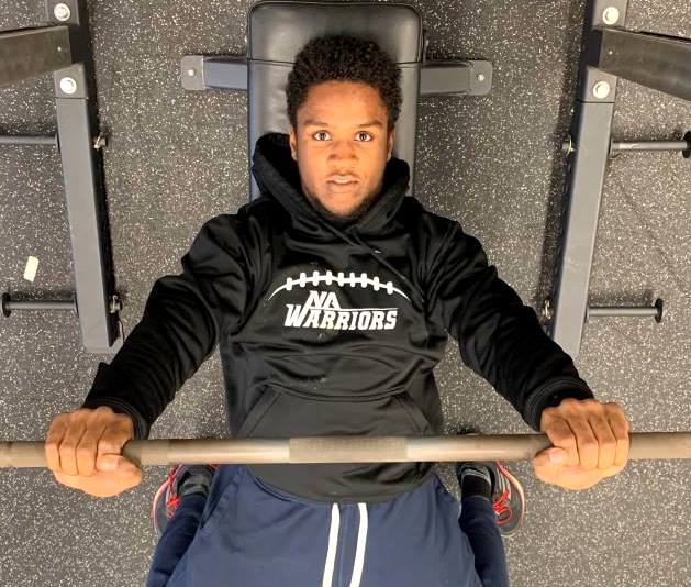 No Pain, No Gain: Senior football standout Wesley Horton knows full well the principle of preparing for the coming season months in advance. He pumps iron in the Warrior weight room to await his next gridiron battle. 