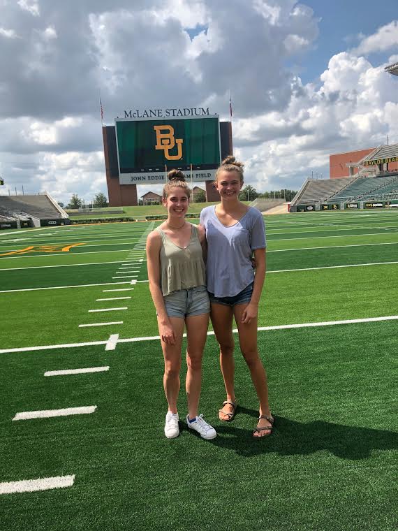 Beaming at Baylor: Juniors Caitlin Hohenstein and Maddie Bartlett smile as they take in the scenery at Baylor University