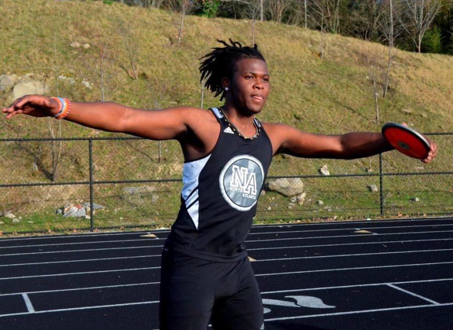 Senior JacQuaran Evans readies for another throw for distance in the discus event