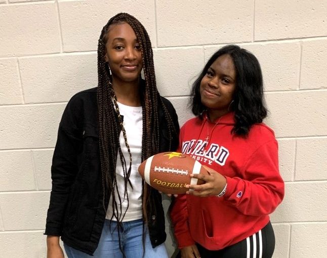 Down Set Hut!: Members junior Aspyn Okantah and senior Sanaa Hardy rep the Girls Flag Football team. 