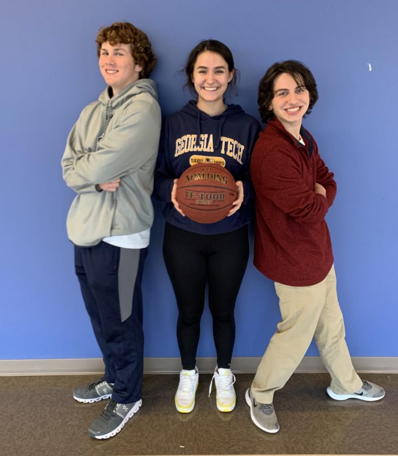 School Spirit: Juniors Charlie Ferguson, Honor Crandall, and Troy Walts dress up for Jersey Day