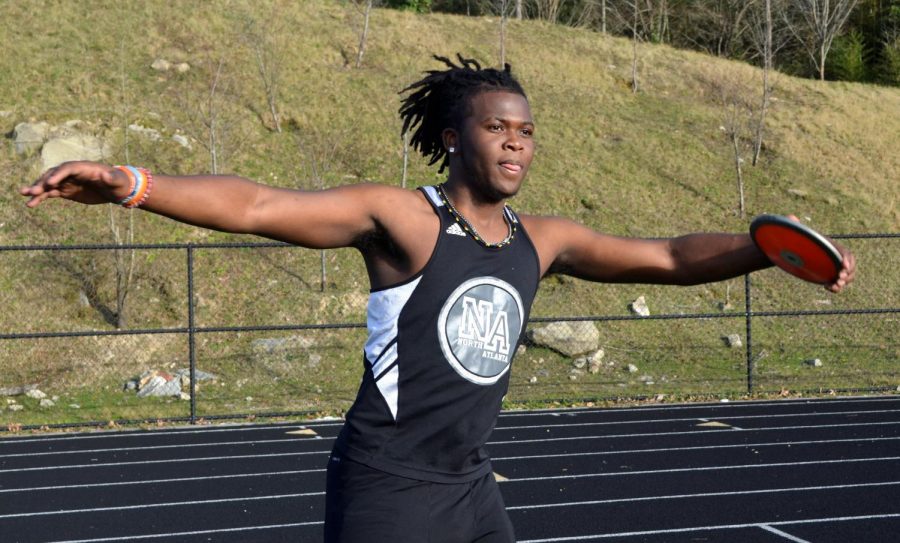 Record Breaker: Senior JacQuaran Evans, who broke a school record this spring in the discus throw, is one of many spring season athletes who met success during pandemic-shortened seasons. 

